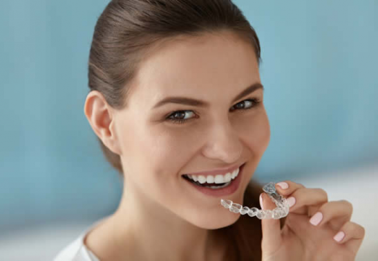 Dakota Orthodontics of Fargo can fit you with clear aligners to help straighten your teeth.